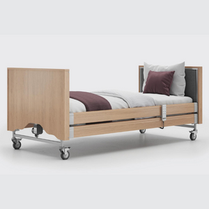 This profiling bed has the functionality of the Classic, with an upholstered inlay in the head and foot board, in a choice of fabrics.