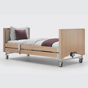 This profiling bed has the functionality of the Classic, with an upholstered inlay in the head and foot board, in a choice of fabrics.