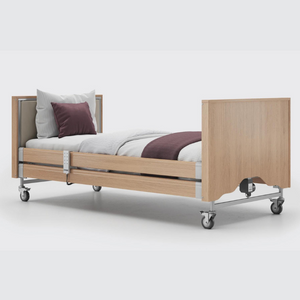 This profiling bed has the functionality of the Classic, with an upholstered inlay in the head and foot board, in a choice of fabrics.