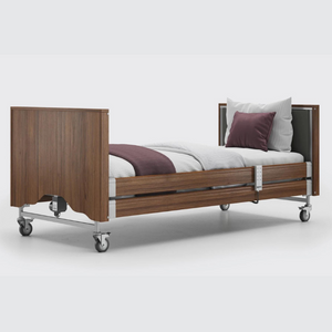 This profiling bed has the functionality of the Classic, with an upholstered inlay in the head and foot board, in a choice of fabrics.