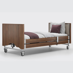 This profiling bed has the functionality of the Classic, with an upholstered inlay in the head and foot board, in a choice of fabrics.