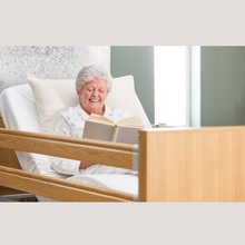 Load image into Gallery viewer, The Opera Enclosed 3ft Low Classic Profiling Bed is perfect for those who need a little bit of extra help when it comes to getting in and out of bed. The bed can be lowered to just 22cm from the floor, greatly reducing the risk of impact injury from falls. 