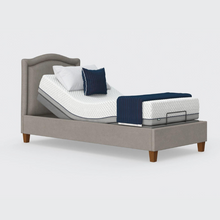 Load image into Gallery viewer, The Flyte is raised on four wooden legs to give underbed clearance. Comes as standard with back/leg adjustment, wireless control and zero gravity mode.