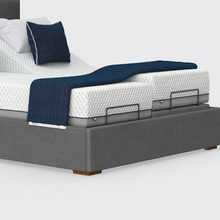 Load image into Gallery viewer, The Hagen Dual has a split/twin mattress platform allowing each side to be controlled independently. The bed a deep base design with four wooden corner feet.