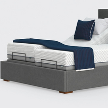 Load image into Gallery viewer, The Hagen Dual has a split/twin mattress platform allowing each side to be controlled independently. The bed a deep base design with four wooden corner feet.