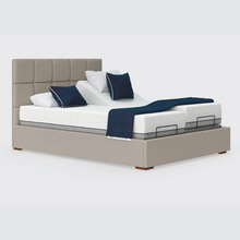 Load image into Gallery viewer, The Hagen Dual has a split/twin mattress platform allowing each side to be controlled independently. The bed a deep base design with four wooden corner feet.