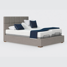 Load image into Gallery viewer, The Hagen Dual has a split/twin mattress platform allowing each side to be controlled independently. The bed a deep base design with four wooden corner feet.