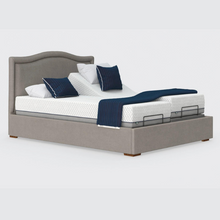 Load image into Gallery viewer, The Hagen Dual has a split/twin mattress platform allowing each side to be controlled independently. The bed a deep base design with four wooden corner feet.