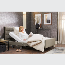 Load image into Gallery viewer, The Opera Signature Comfort Profiling Bed is the ultimate care bed for operators and users wanting to achieve a homely care environment. The bed has a fully upholstered surround and has headboard, fabric and width options.