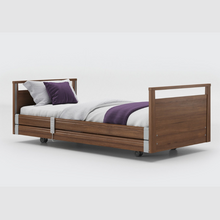 Load image into Gallery viewer, Opera Signature Profiling Bed With Cot Sides is an elegantly-styled care bed designed for user mobility and nursing care. Ideal for users with advanced care needs that want to maintain a homely and inviting care environment.