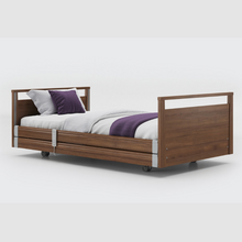 Load image into Gallery viewer, Opera Signature Profiling Bed With Cot Sides is an elegantly-styled care bed designed for user mobility and nursing care. Ideal for users with advanced care needs that want to maintain a homely and inviting care environment.