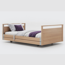 Load image into Gallery viewer, Opera Signature Profiling Bed With Cot Sides is an elegantly-styled care bed designed for user mobility and nursing care. Ideal for users with advanced care needs that want to maintain a homely and inviting care environment.