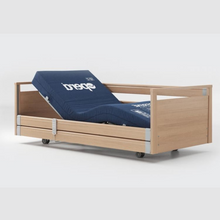 Load image into Gallery viewer, Opera Signature Profiling Bed With Cot Sides is an elegantly-styled care bed designed for user mobility and nursing care. Ideal for users with advanced care needs that want to maintain a homely and inviting care environment.