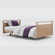 Load image into Gallery viewer, The Opera® Signature bed is height adjustable, making it suitable for both nursing care and ease of access. The bed&#39;s extensive height range allows it to be lowered close to the floor and raised up to a carer&#39;s waist level to make it easier to provide care.