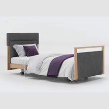 Load image into Gallery viewer, The Opera® Signature Upholstered is height adjustable for nursing and access. The bed has an extensive height range that allows it to be lowered close to the floor and raised to a carer&#39;s waist level.