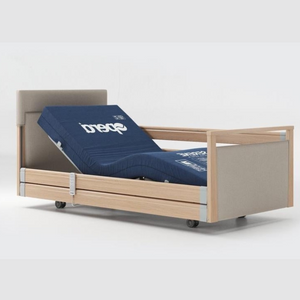 Opera Signature Upholstered Profiling Bed With Cot Sides. The padded head and footboard design ensure's a comfortable and elegant finish. With height adjustment and full profiling features, this care bed is suitable for almost all user types.