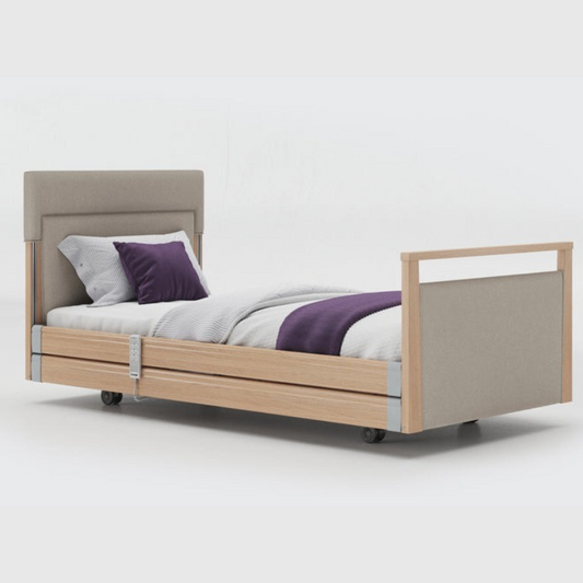 Opera Signature Upholstered Profiling Bed With Cot Sides & Memory Mattress. The padded head and footboard design ensure's a comfortable and elegant finish. With height adjustment and full profiling features, this care bed is suitable for almost all user types._img
