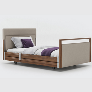 Opera Signature Upholstered Profiling Bed With Cot Sides & Memory Mattress. The padded head and footboard design ensure's a comfortable and elegant finish. With height adjustment and full profiling features, this care bed is suitable for almost all user types.