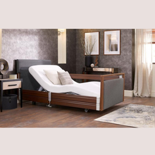 Load image into Gallery viewer, Opera Signature Upholstered Profiling Bed. The padded head and footboard design ensure&#39;s a comfortable and elegant finish. With height adjustment and full profiling features, this care bed is suitable for almost all user types.