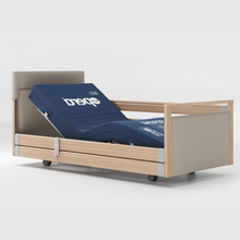 Load image into Gallery viewer, Opera Signature Upholstered Profiling Bed. The padded head and footboard design ensure&#39;s a comfortable and elegant finish. With height adjustment and full profiling features, this care bed is suitable for almost all user types.