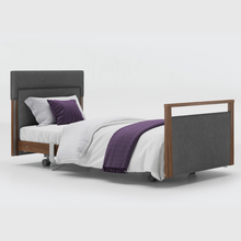 Load image into Gallery viewer, Opera Signature Upholstered Profiling Bed. The padded head and footboard design ensure&#39;s a comfortable and elegant finish. With height adjustment and full profiling features, this care bed is suitable for almost all user types.