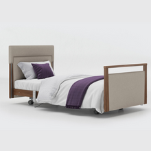 Load image into Gallery viewer, Opera Signature Upholstered Profiling Bed. The padded head and footboard design ensure&#39;s a comfortable and elegant finish. With height adjustment and full profiling features, this care bed is suitable for almost all user types.