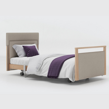 Load image into Gallery viewer, Opera Signature Upholstered Profiling Bed. The padded head and footboard design ensure&#39;s a comfortable and elegant finish. With height adjustment and full profiling features, this care bed is suitable for almost all user types.