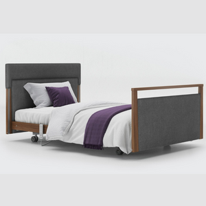 Opera Signature Upholstered Profiling Bed. The padded head and footboard design ensure's a comfortable and elegant finish. With height adjustment and full profiling features, this care bed is suitable for almost all user types.