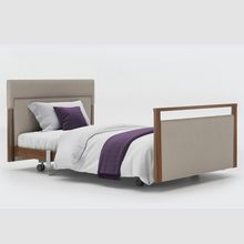 Load image into Gallery viewer, Opera Signature Upholstered Profiling Bed. The padded head and footboard design ensure&#39;s a comfortable and elegant finish. With height adjustment and full profiling features, this care bed is suitable for almost all user types.