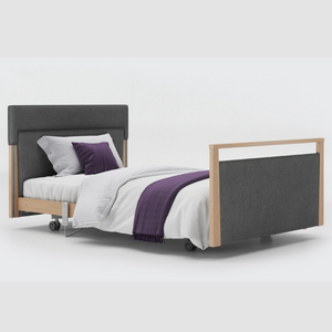 Opera Signature Upholstered Profiling Bed. The padded head and footboard design ensure's a comfortable and elegant finish. With height adjustment and full profiling features, this care bed is suitable for almost all user types.