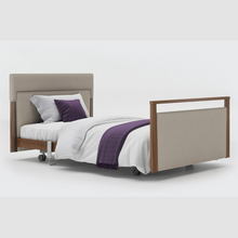 Load image into Gallery viewer, Opera Signature Upholstered Profiling Bed. The padded head and footboard design ensure&#39;s a comfortable and elegant finish. With height adjustment and full profiling features, this care bed is suitable for almost all user types.