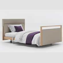 Load image into Gallery viewer, Opera Signature Upholstered Profiling Bed. The padded head and footboard design ensure&#39;s a comfortable and elegant finish. With height adjustment and full profiling features, this care bed is suitable for almost all user types.