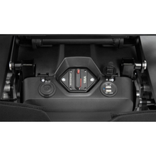 Load image into Gallery viewer, Particularly suitable for users who frequently turn off their wheelchair – for example on board an airplane. The circuit breaker is easily accessible on the front of every Juvo wheelchair. Optional power supplies (USB and/or 12/24 V outlets) ensure that power is always available for your mobile devices.