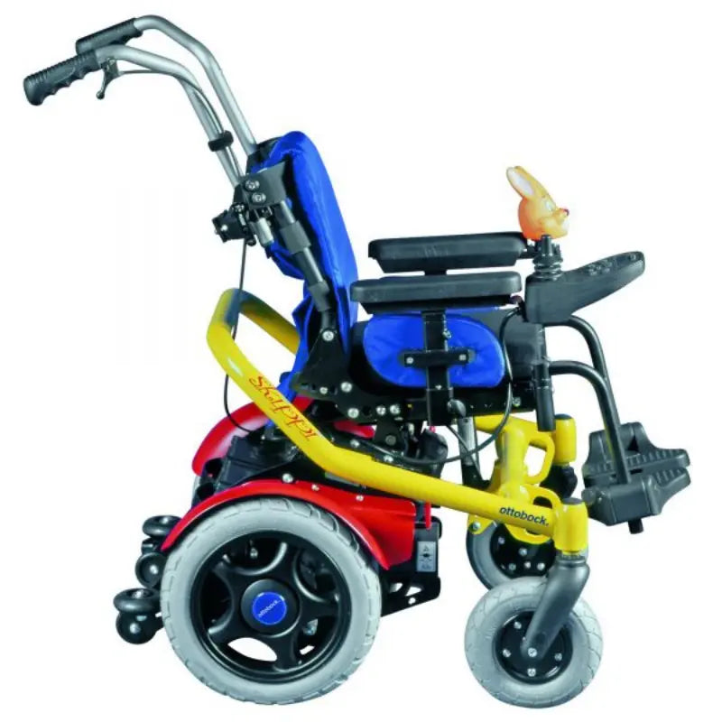 Welcome to the world of the Skippi, the perfect rear-wheel-drive powerchair for active kids! This fun and colorful chair is compact yet still retains large-size drive wheels and castors, so kids can explore their environment with the push of a joystick.