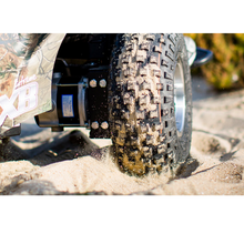 Load image into Gallery viewer, The Extreme X8 has an exceptionally smooth, jolt-free ride delivering unparalleled comfort. This is due to the suspension that keeps all four driving wheels on the ground and smooths the impact of small bumps and changes in the elevation of the terrain. 