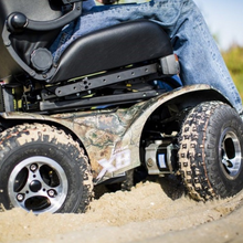 Load image into Gallery viewer, The Extreme X8 has an exceptionally smooth, jolt-free ride delivering unparalleled comfort. This is due to the suspension that keeps all four driving wheels on the ground and smooths the impact of small bumps and changes in the elevation of the terrain. 