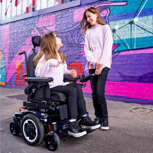 Load image into Gallery viewer, The Q300 M Mini Teens is also ridiculously compact and manoeuvrable, making it perfect for busy classrooms or hallways. There&#39;s no need to out-grow your powerchair when you can have the QUICKIE Q300 M Mini Teens.